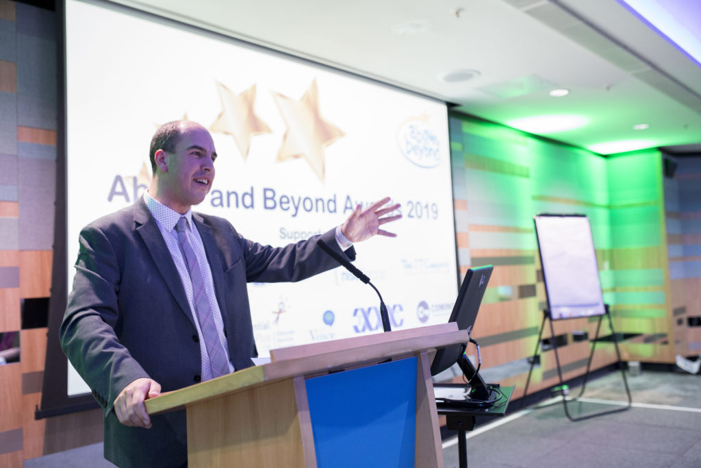 Adam Boddison presenting at a conference