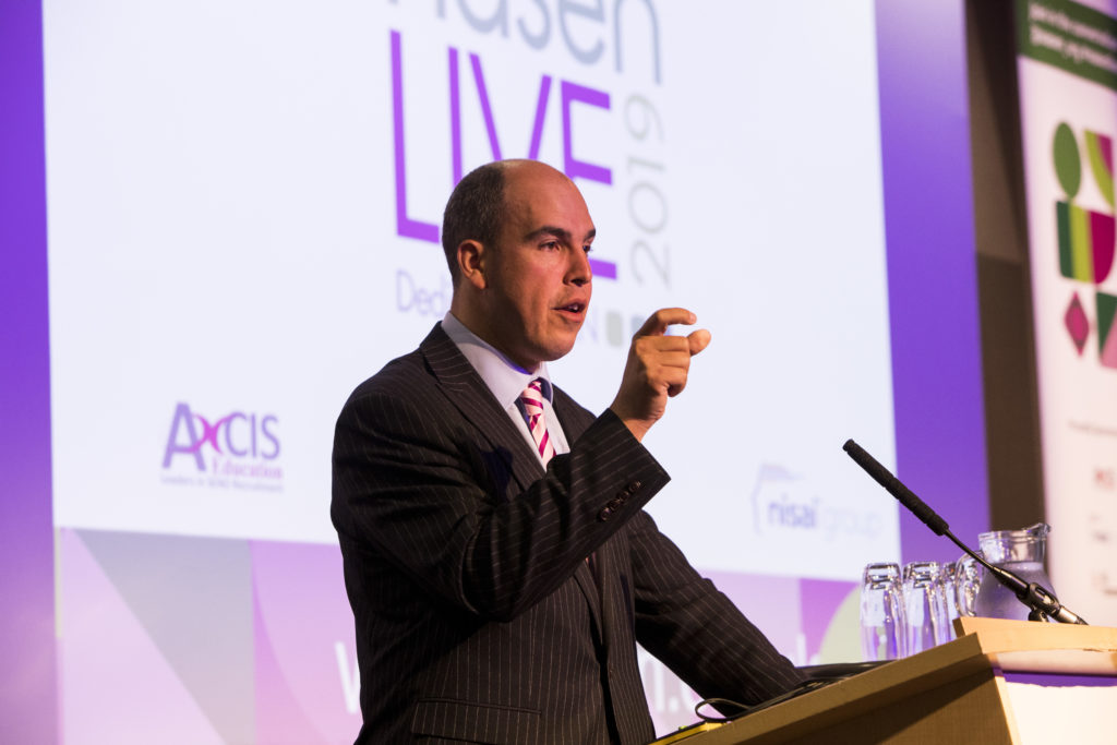 Adam Boddison speaking on stage at nasen Live